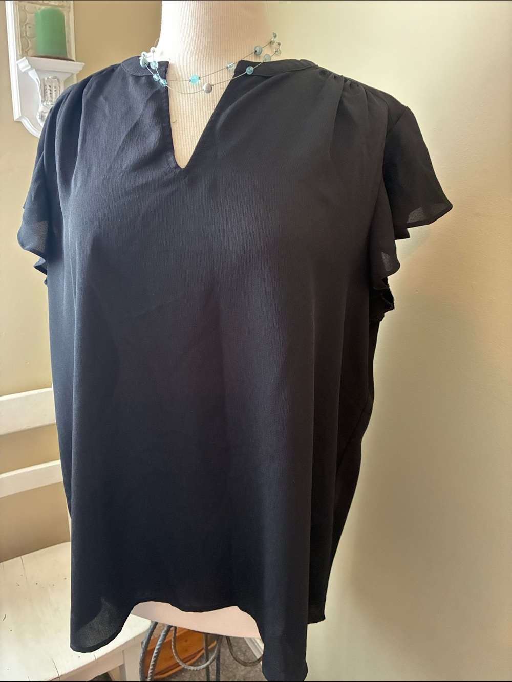 Investments Black V-Notch Flutter Sleeve Blouse